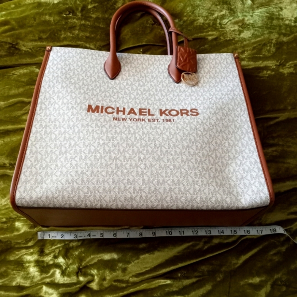 NWT MICHAEL KORS BAG. 14 X 16, BEIGE AND BROWN.SHOULDER STRAP AND HAND HANDLES.
